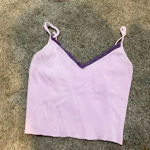 Cute purple tank top worn very little no stains can can go with a lot